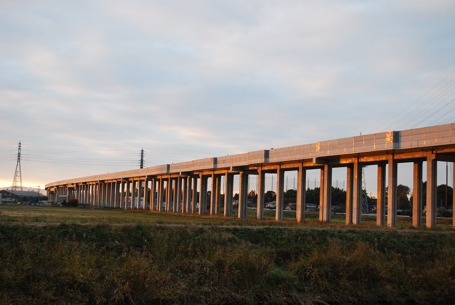 Kyushu Shinkansen elevated railway viaduct near Tosu, Saga, at sunset