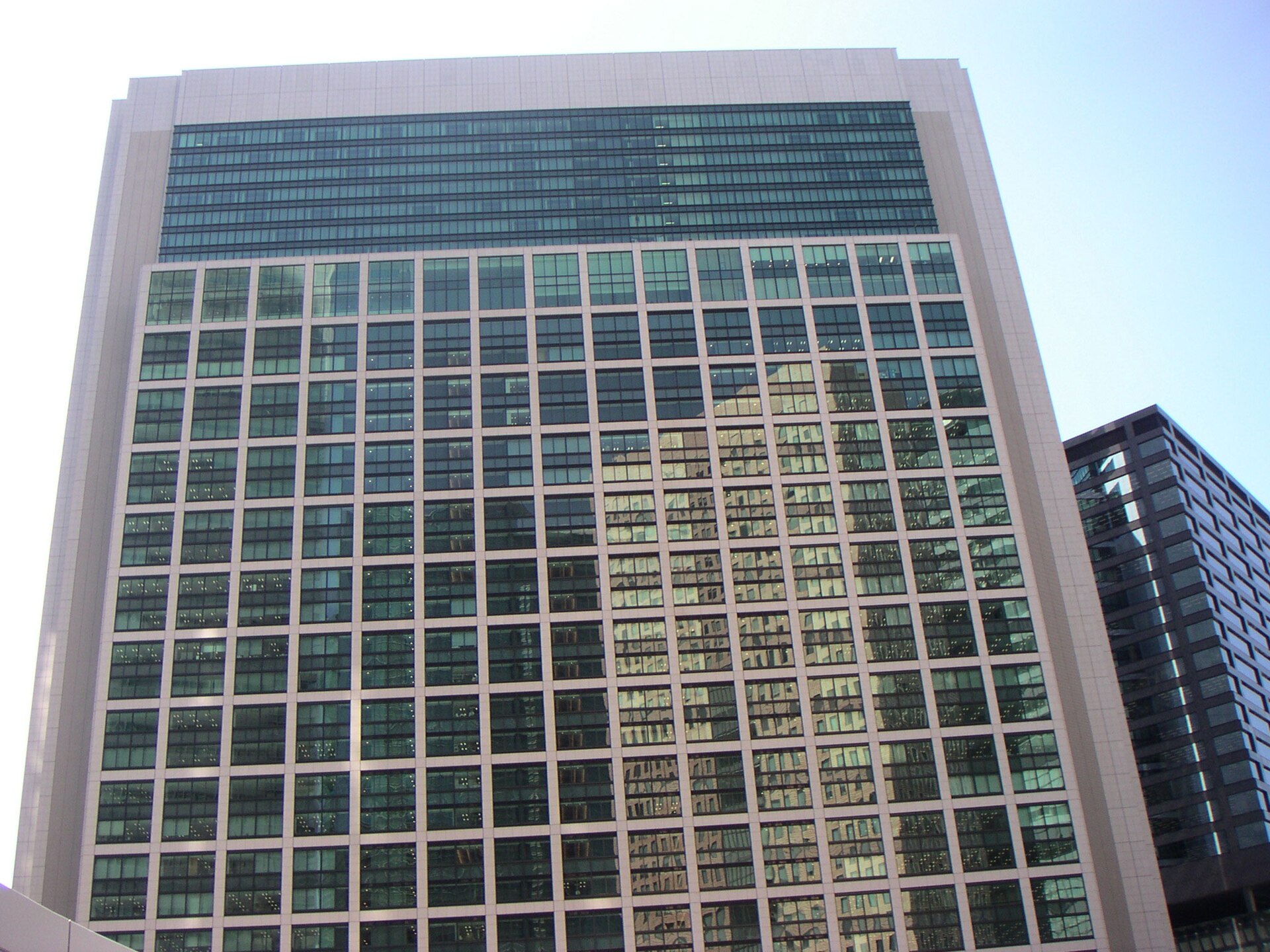 Facade of the SoftBank corporate building with glass high-rise front